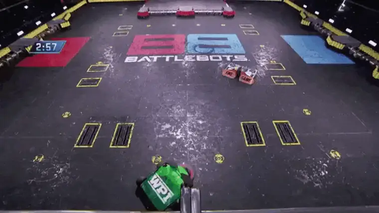 Combat robots battling inside a sealed competition arena